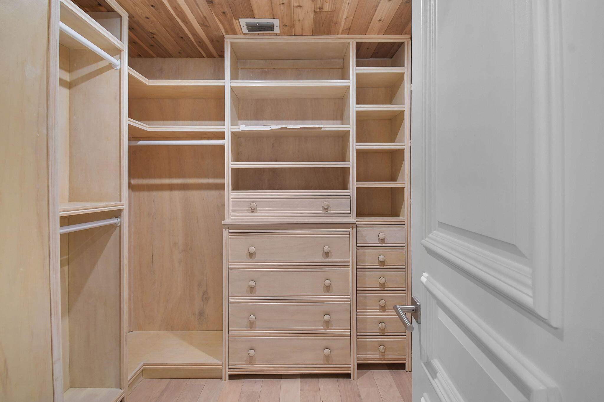 123 Olympus Way Jupiter, FL 33477 - Photo 68 of 116 a view of walk in closet with empty racks