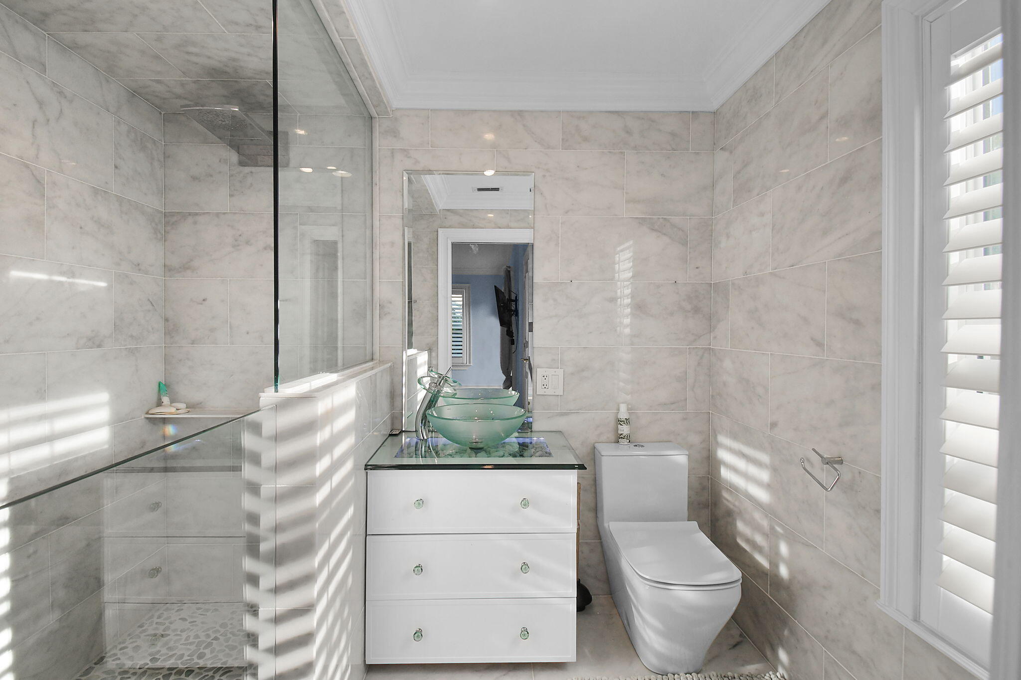 123 Olympus Way Jupiter, FL 33477 - Photo 72 of 116 a bathroom with a granite countertop sink a toilet and shower