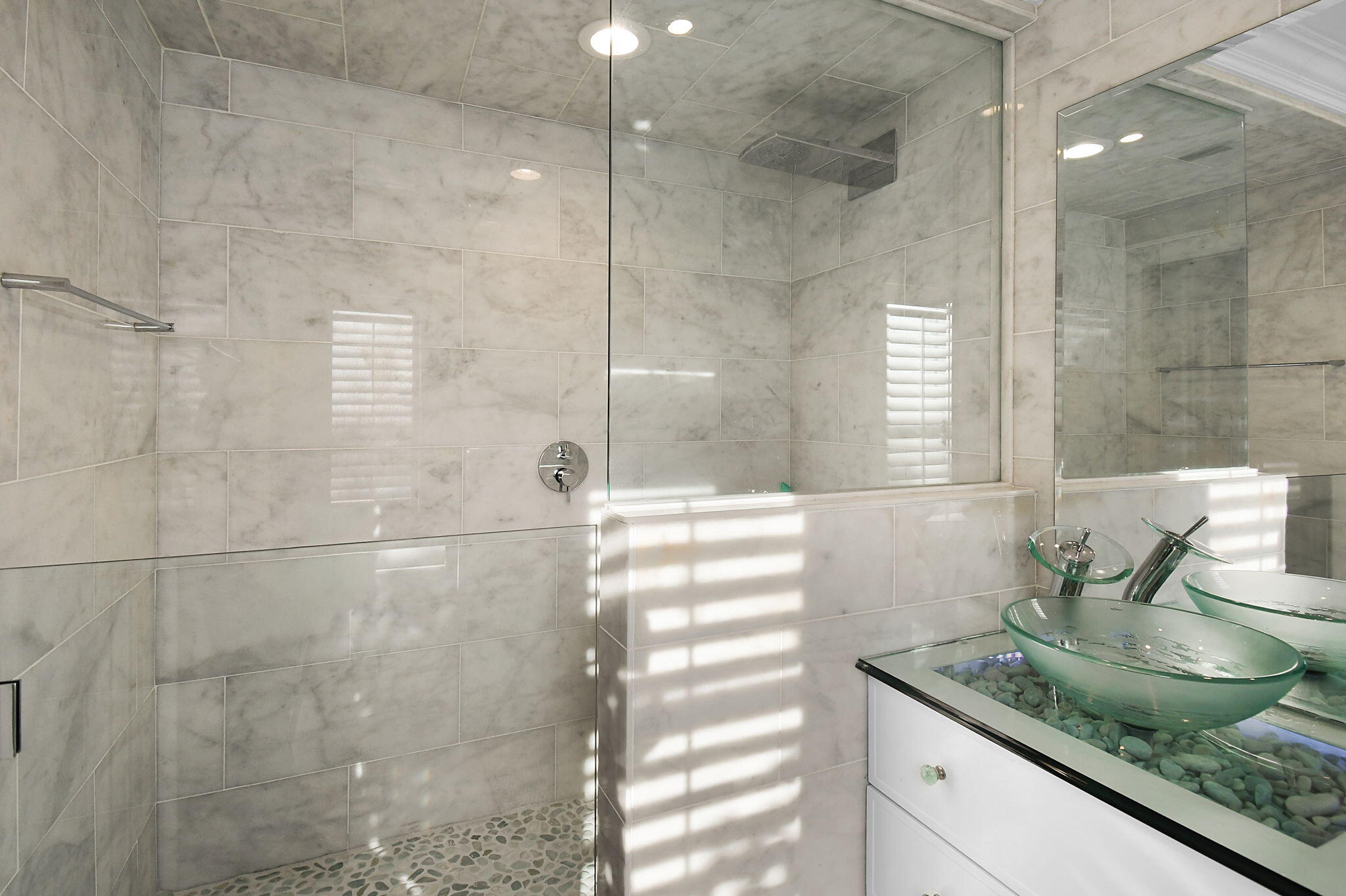 123 Olympus Way Jupiter, FL 33477 - Photo 73 of 116 a bathroom with a granite countertop sink a mirror and shower