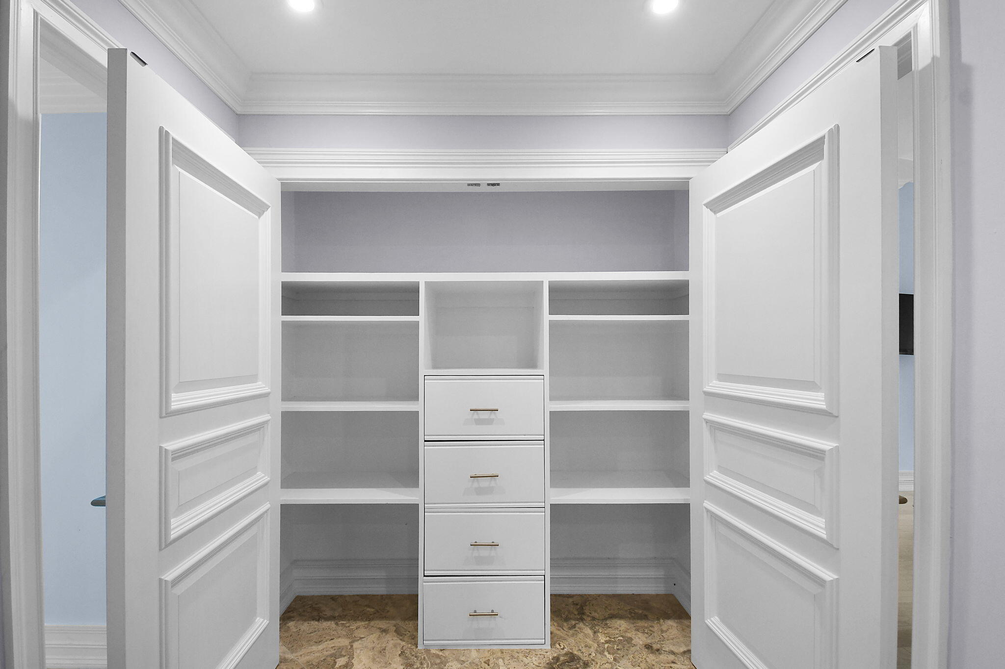 123 Olympus Way Jupiter, FL 33477 - Photo 77 of 116 a view of walk in closet with empty racks