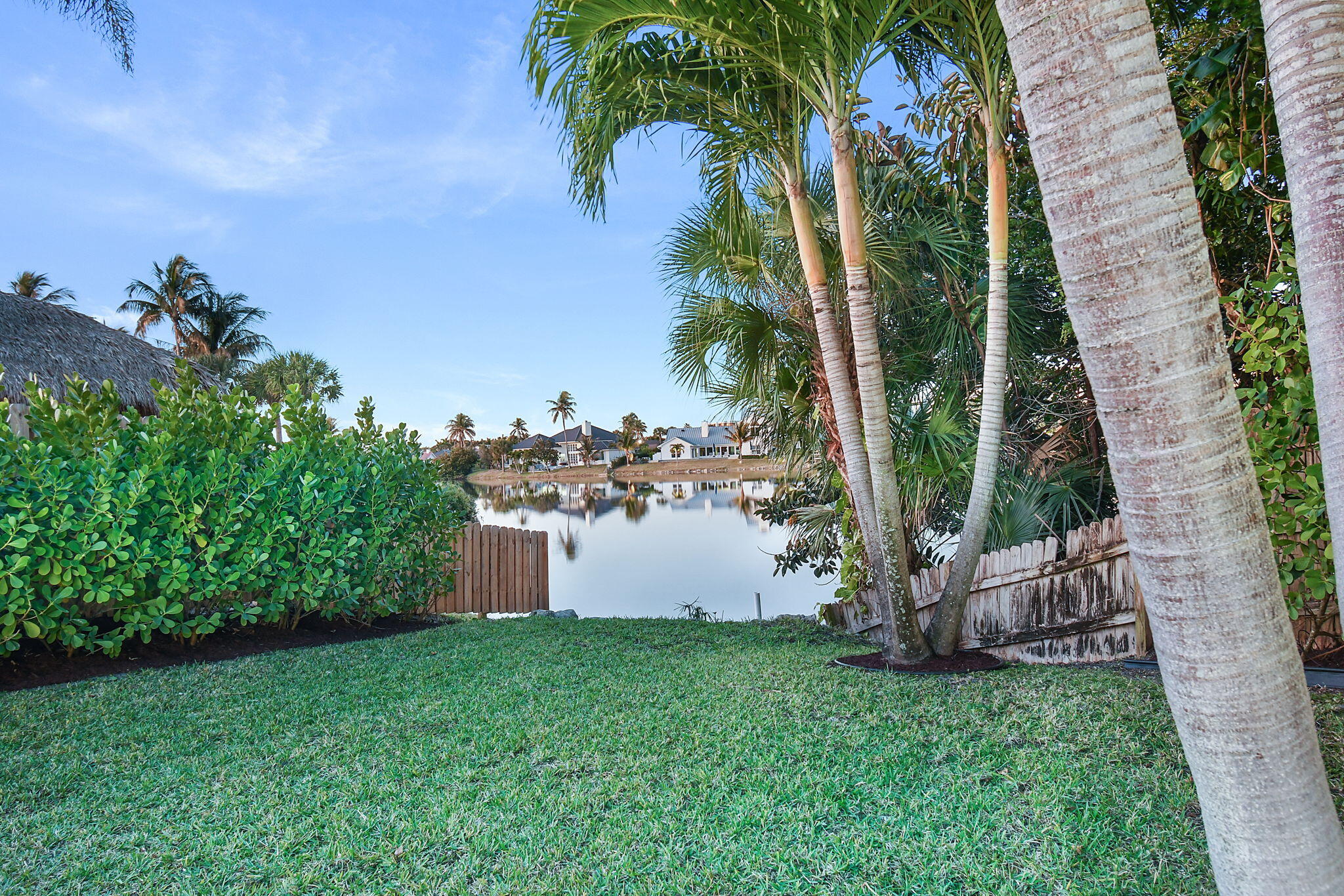 123 Olympus Way Jupiter, FL 33477 - Photo 79 of 116 a backyard of a house with lots of green space