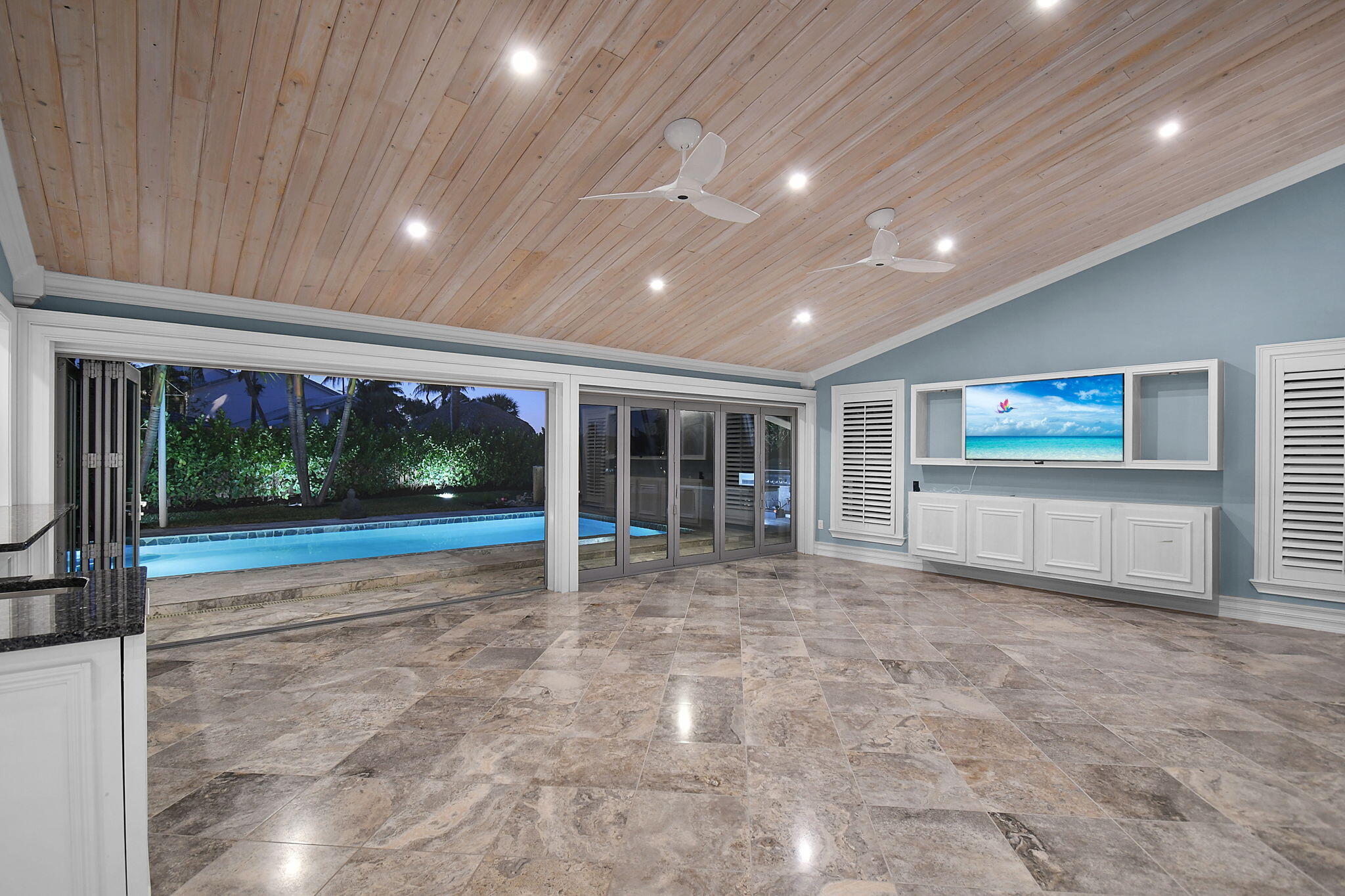 123 Olympus Way Jupiter, FL 33477 - Photo 9 of 116 a view of a room with wooden floor and garden view