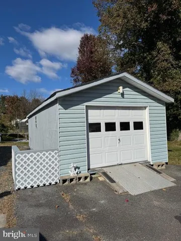a front view of a house with a garage