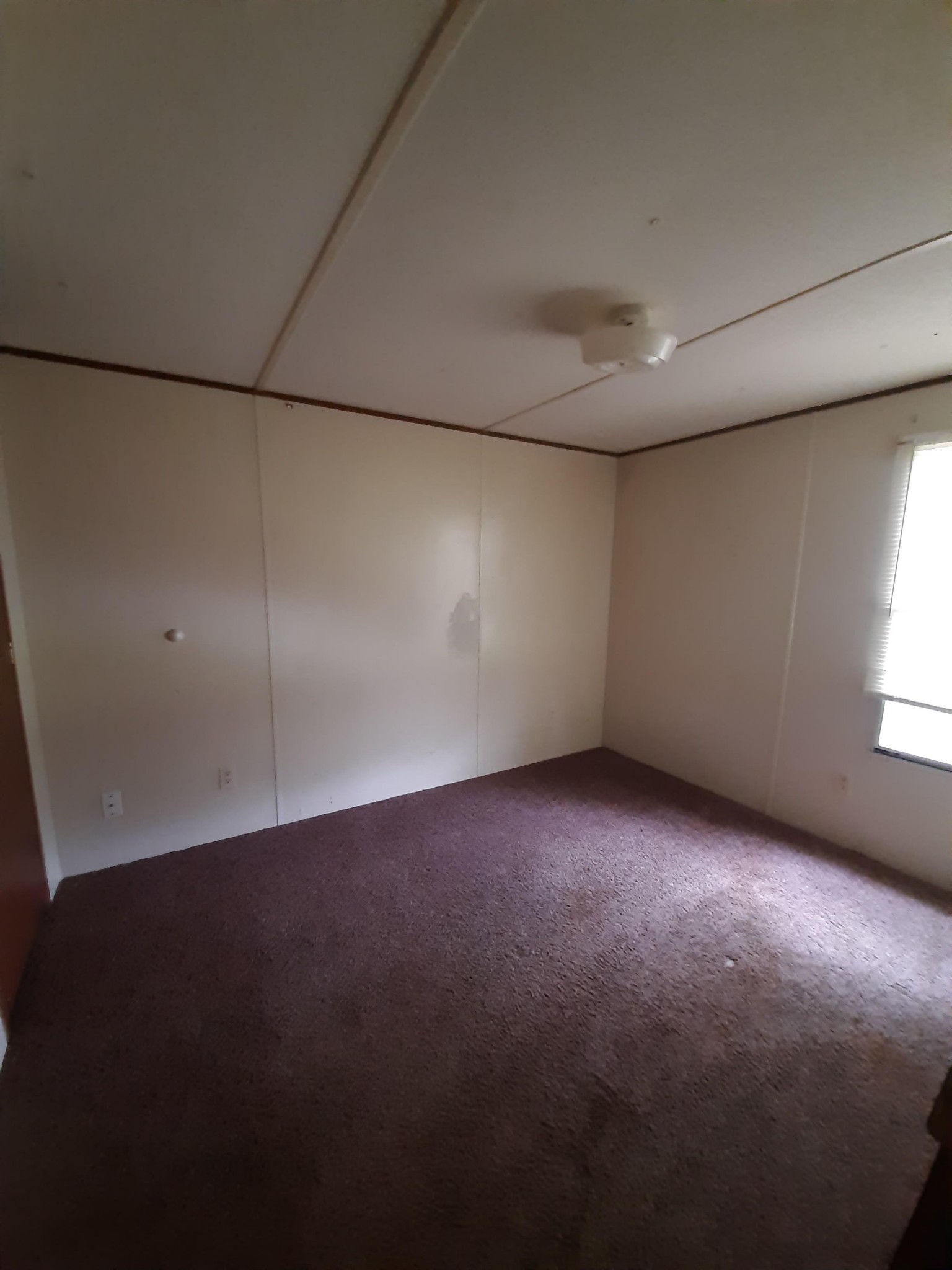 2006 Flat Woods Road Lebanon, TN 37090 - Photo 16 of 24 an empty room with a empty space and windows