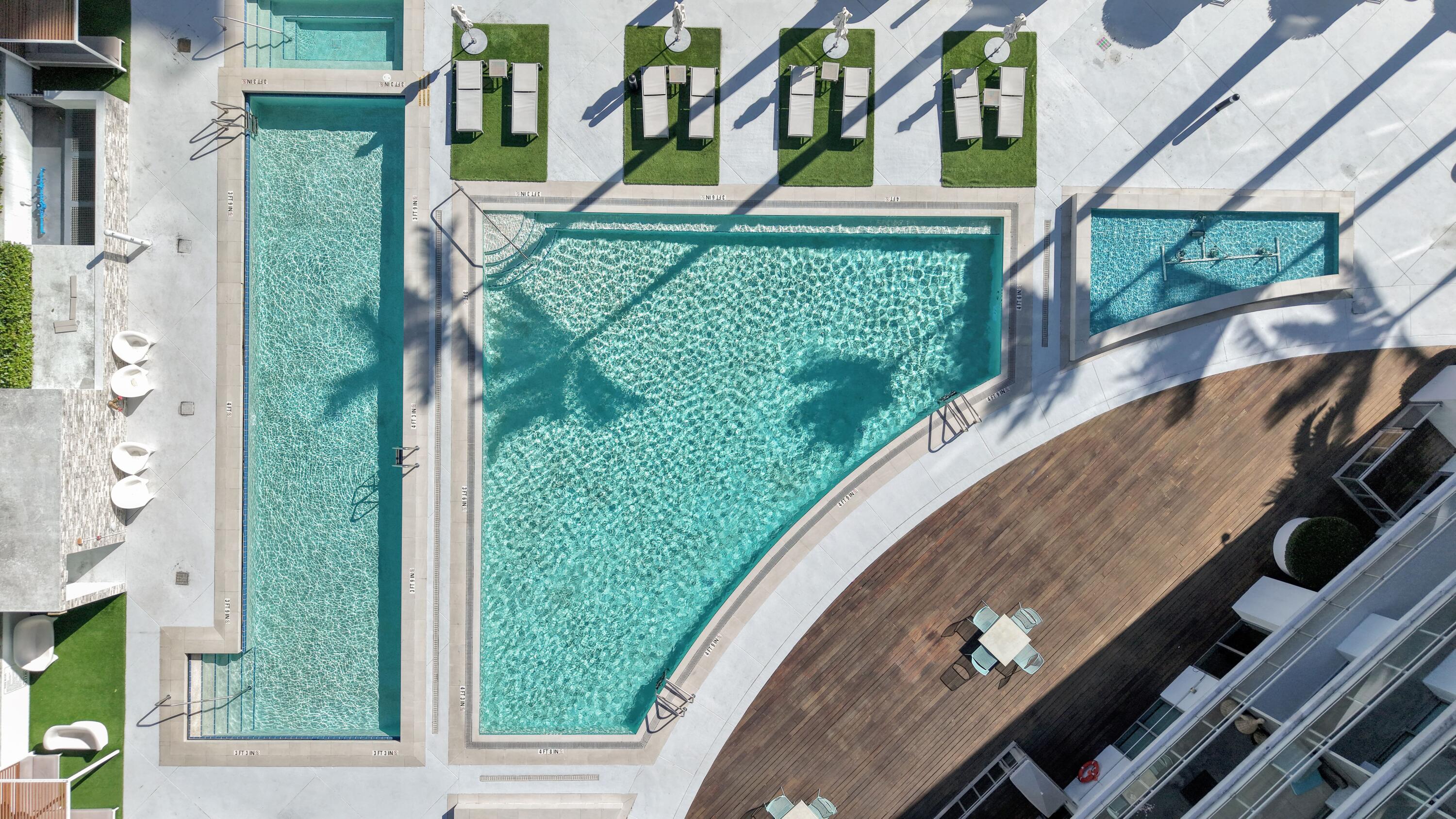 90 Southwest 3rd Street, Unit TH700A Miami, FL 33130 - Photo 1 of 32 a view of a backyard both side of building