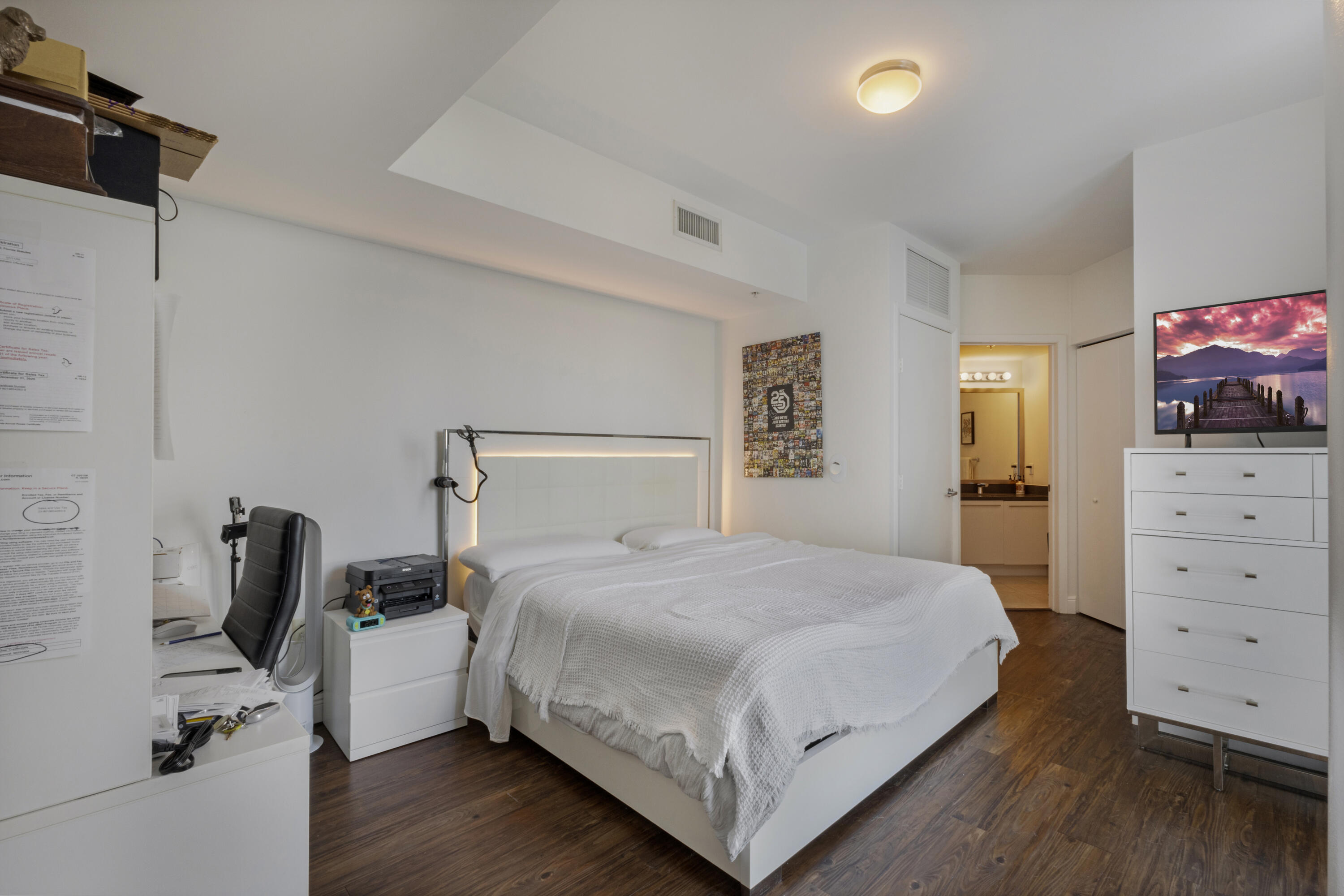 90 Southwest 3rd Street, Unit TH700A Miami, FL 33130 - Photo 11 of 32 a bedroom with a bed and furniture