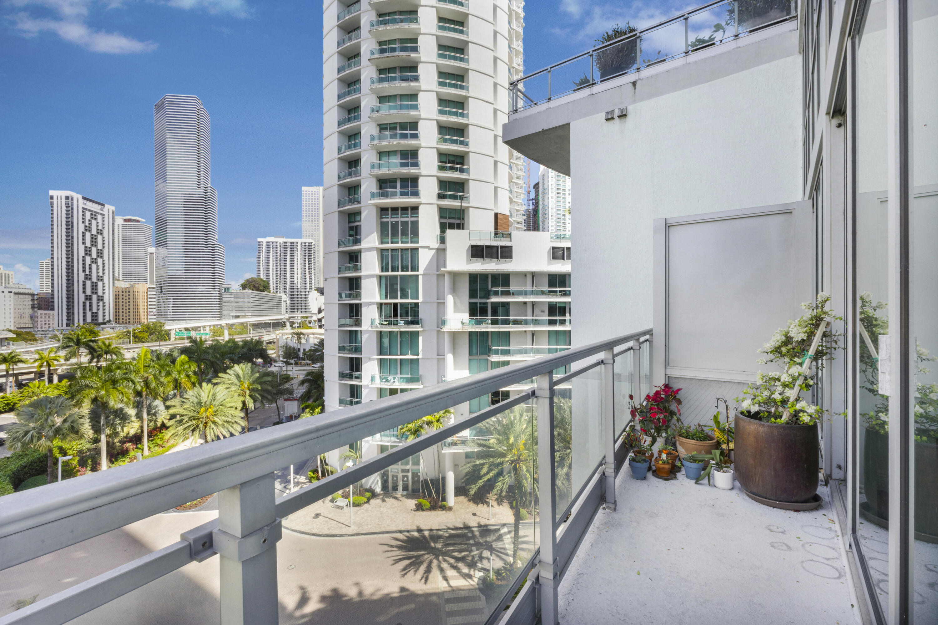 90 Southwest 3rd Street, Unit TH700A Miami, FL 33130 - Photo 16 of 32 a view of balcony with a potted plant