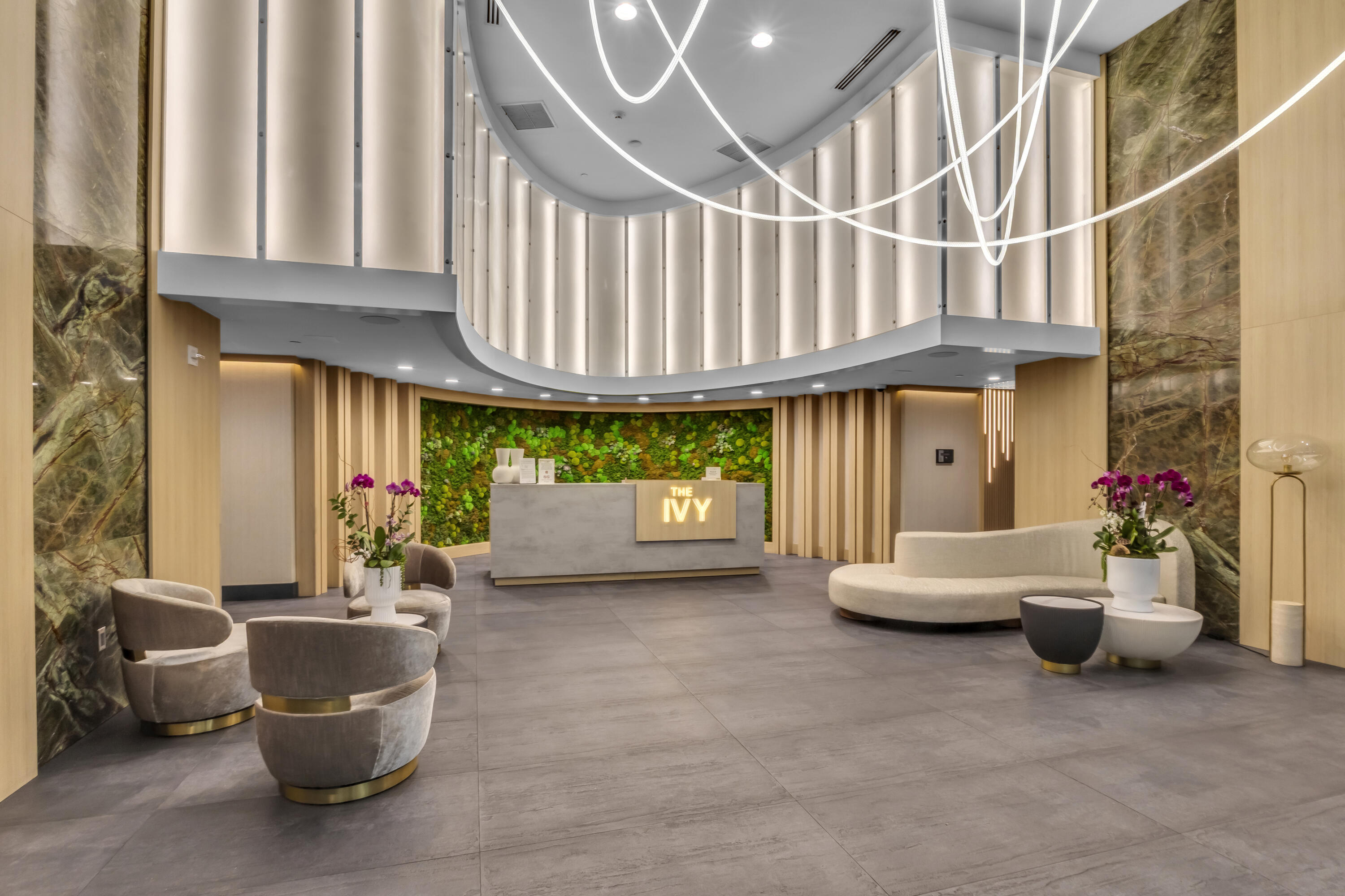 90 Southwest 3rd Street, Unit TH700A Miami, FL 33130 - Photo 18 of 32 a living room with furniture and a potted plant