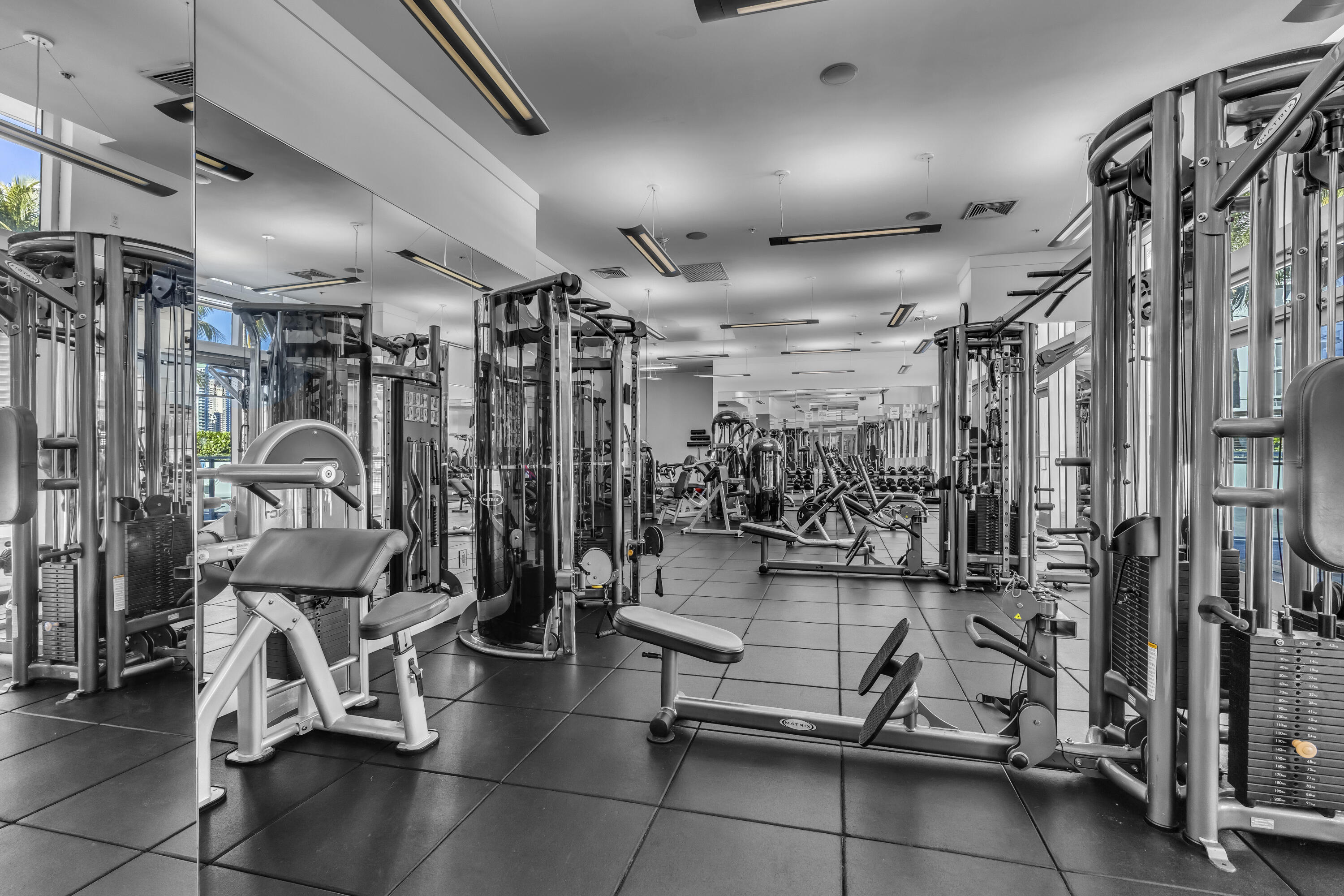 90 Southwest 3rd Street, Unit TH700A Miami, FL 33130 - Photo 24 of 32 a view of a room with gym equipment