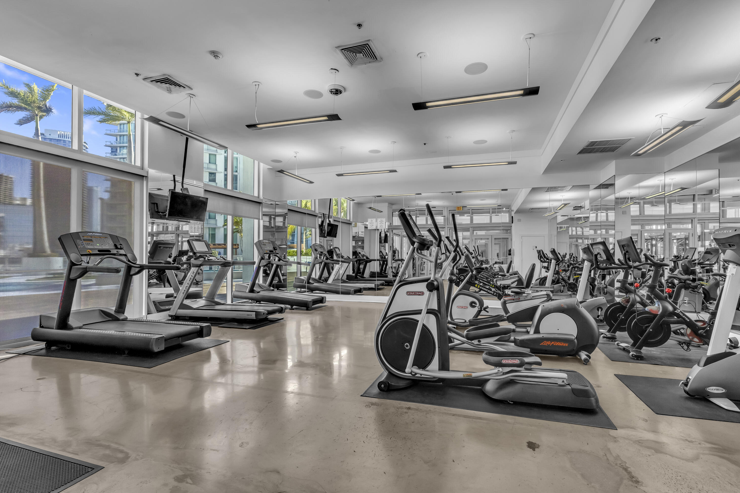 90 Southwest 3rd Street, Unit TH700A Miami, FL 33130 - Photo 25 of 32 a view of a room with gym equipment