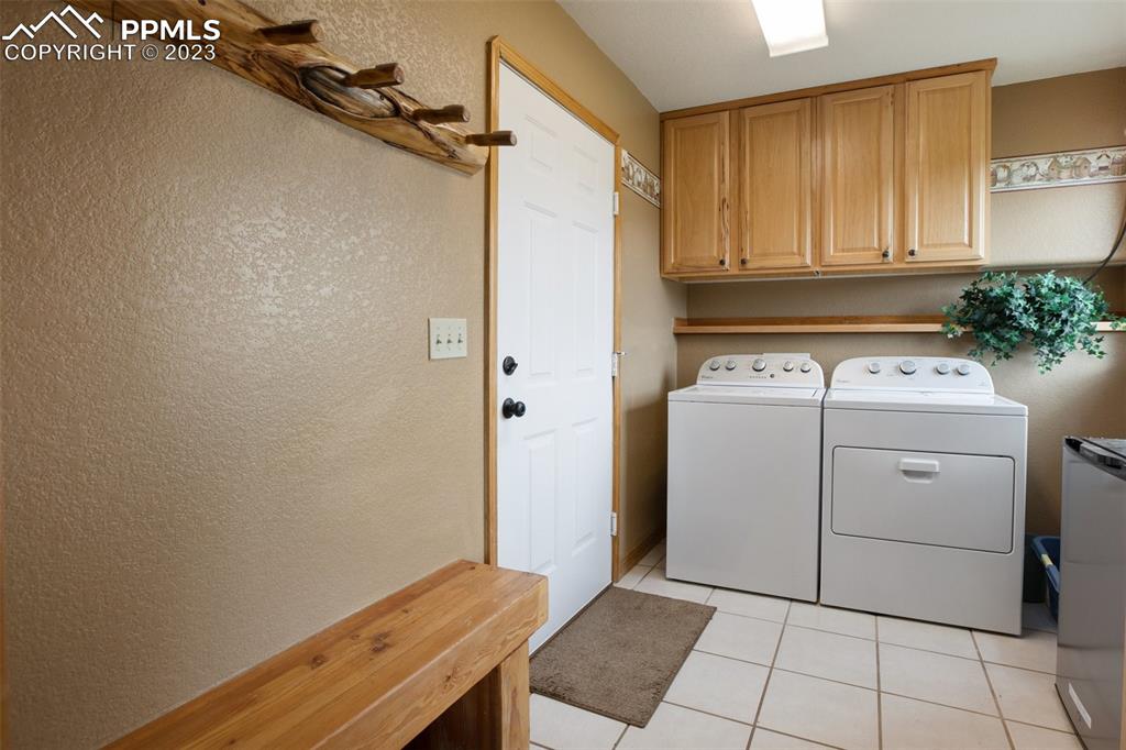113 Matthew Road Divide, CO 80814 - Photo 21 of 49 a utility room with dryer and washer