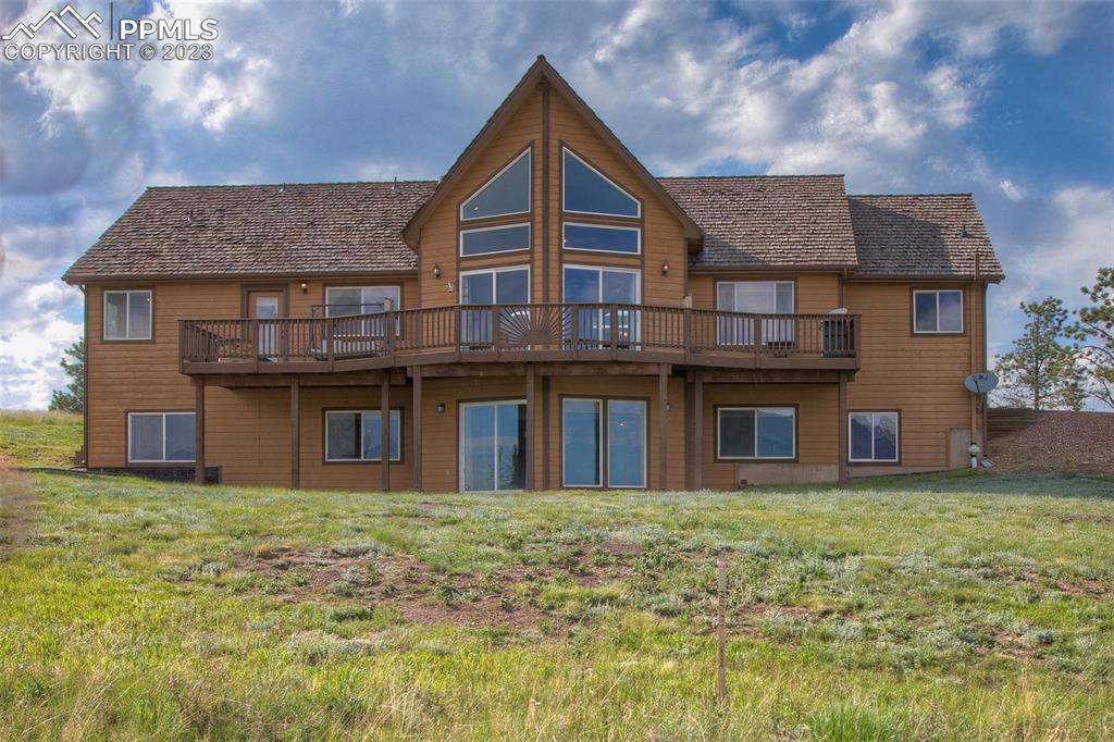 113 Matthew Road Divide, CO 80814 - Photo 46 of 49 a front view of a house with garden