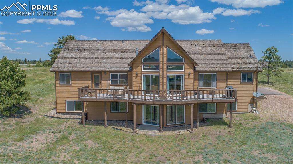113 Matthew Road Divide, CO 80814 - Photo 47 of 49 a view of a house with a yard balcony and furniture
