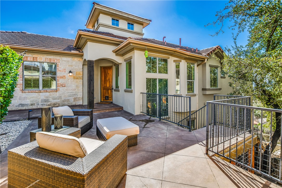 8546 Adirondack Trail, Unit 10 Austin, TX 78759 - Photo 1 of 1 a view of a house with couches and wooden floor