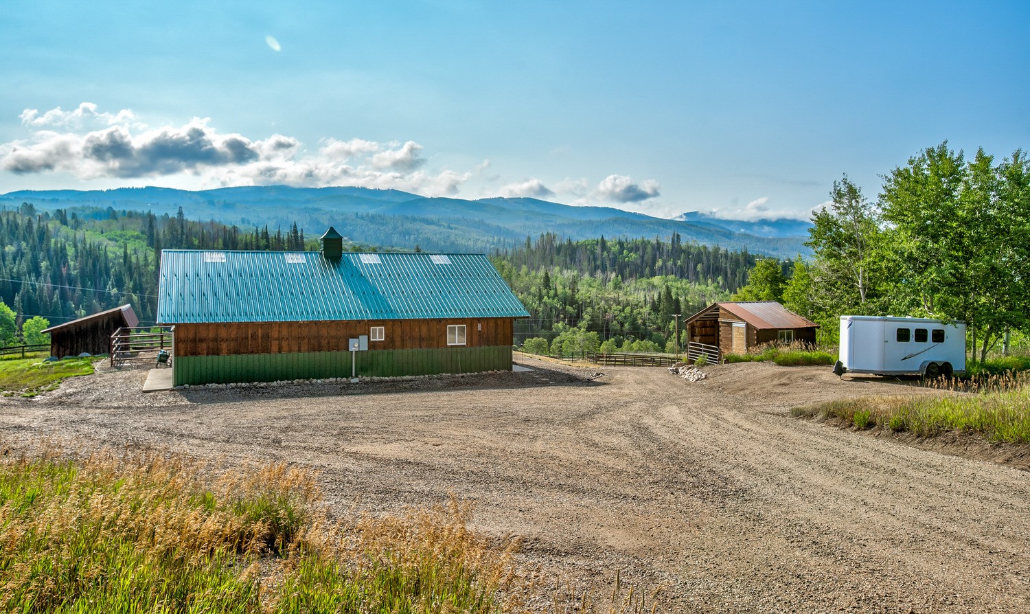 31775 Bradley Ranch Steamboat Springs, CO 80487 - Photo 24 of 49 a view of a house with a yard and potted plants
