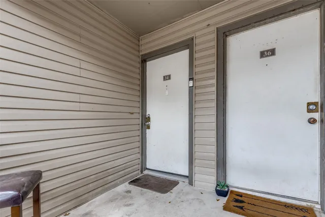 a view of front door and utility room