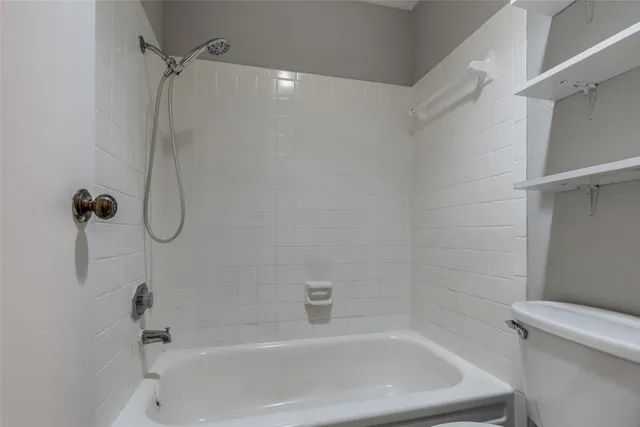 a close view of a bathtub in a bathroom