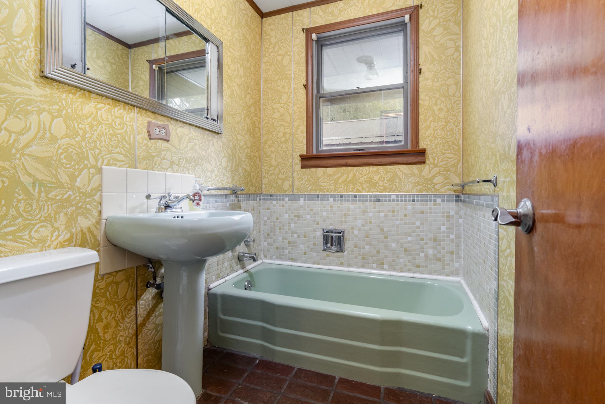 199 State Road Barnesville, PA 18214 - Photo 24 of 55 a bathroom with a sink mirror bathtub and toilet