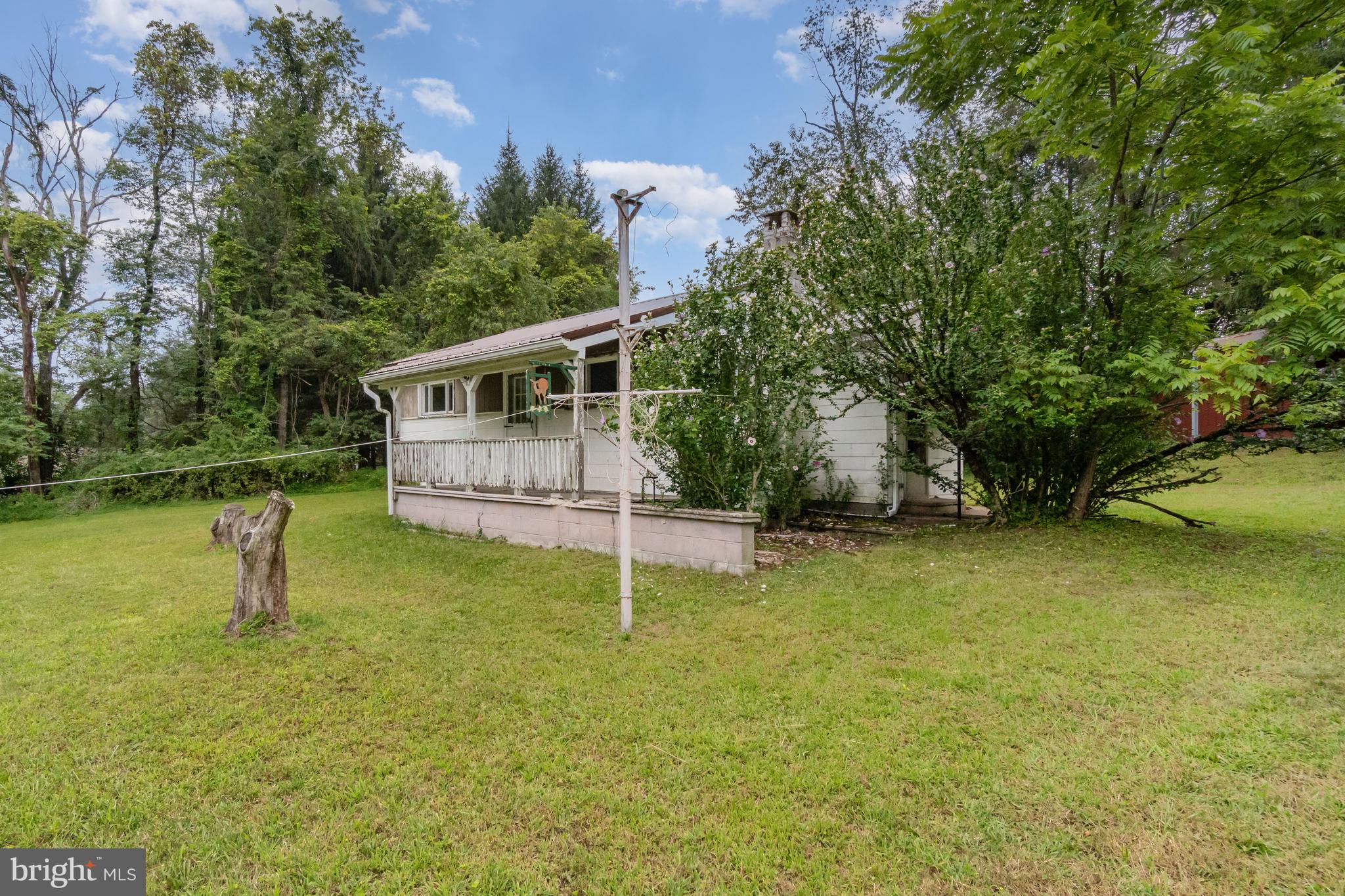 199 State Road Barnesville, PA 18214 - Photo 29 of 55 a backyard of a house with lots of green space