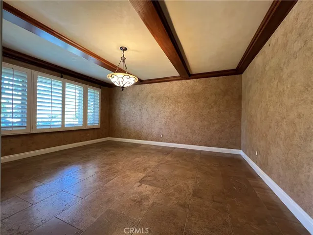 a living room with fireplace furniture and a wooden floor