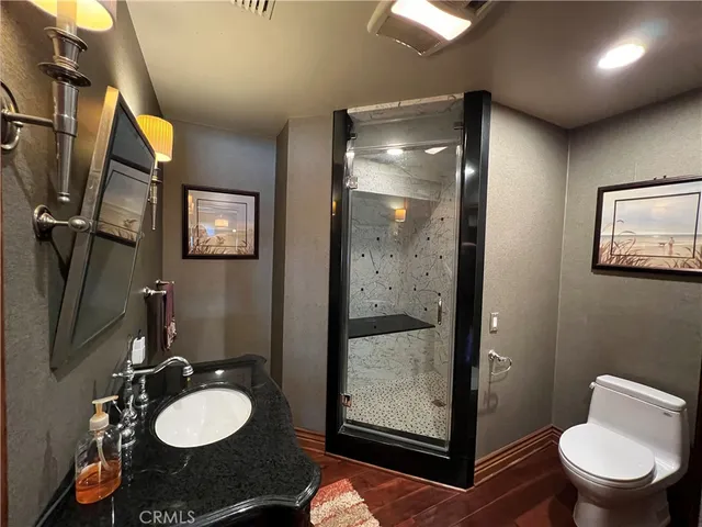 a room with furniture pool table table tennis and a rug