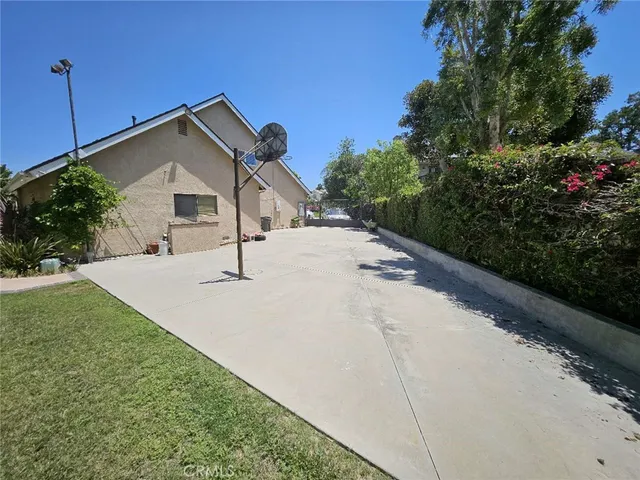 a view of a backyard with a garden