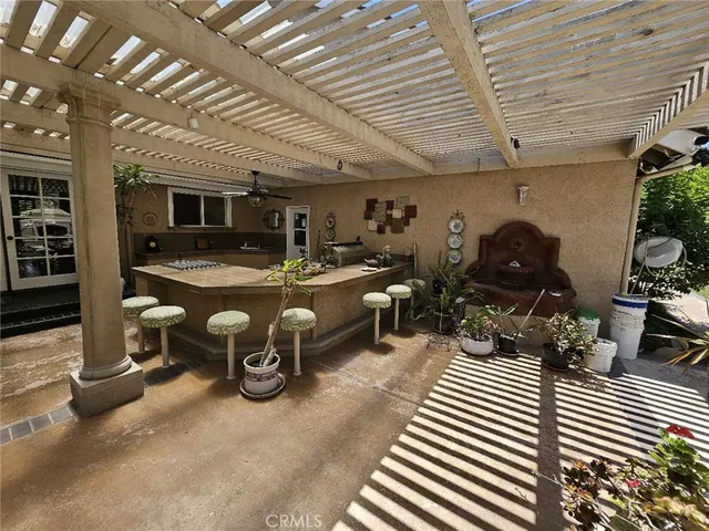 a kitchen with a dining table and chairs