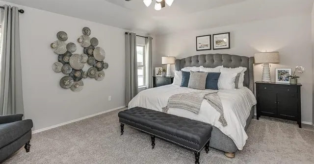 a spacious bathroom with a double vanity sink and mirror