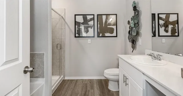 a bedroom with a bed and furniture