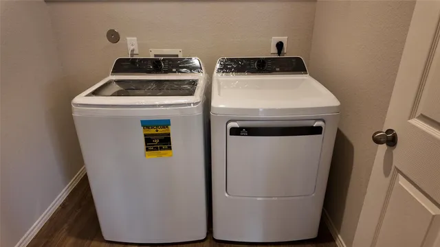 an aerial view of a house having yard