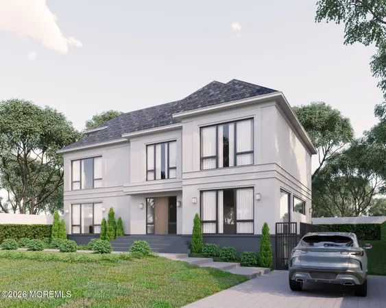 a car parked in front of a white house