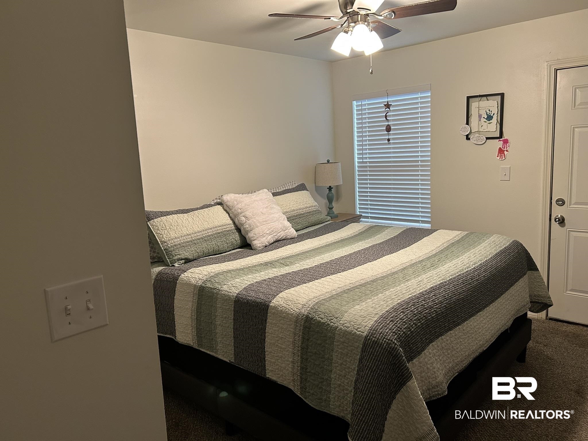 2 Canterberry Circle Foley, AL 36535 - Photo 8 of 24 Bedroom featuring ceiling fan and carpet