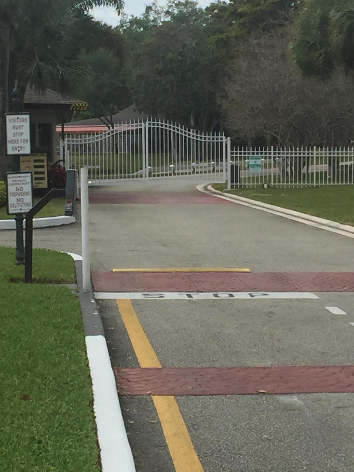 4267 Wood Ride Road, Unit B Boynton Beach, FL 33436 - Photo 2 of 34 Gate Entry