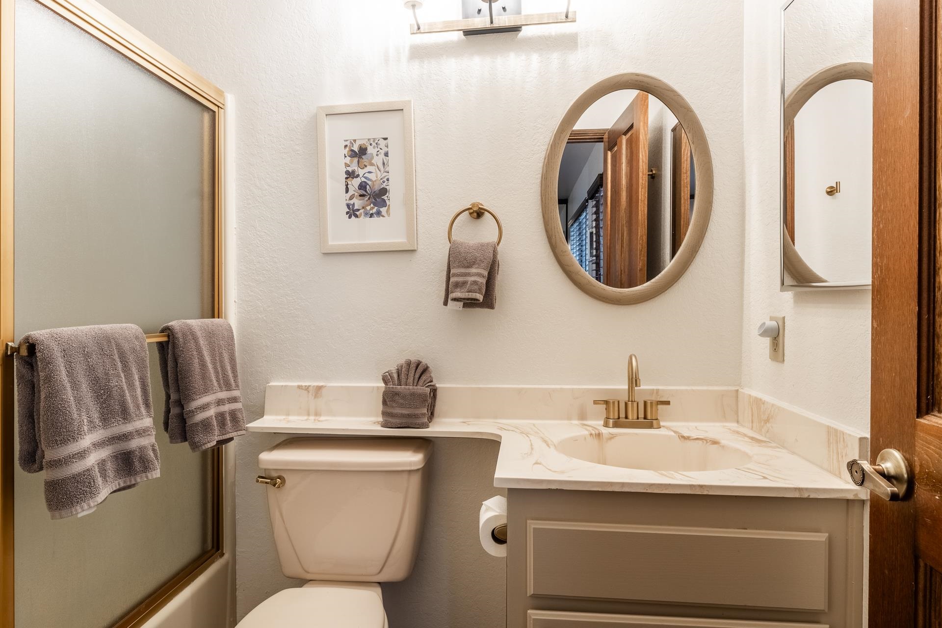 354 Joaquin Road, Unit 4 Mammoth Lakes, CA 93546 - Photo 24 of 40 Full bathroom featuring vanity and shower / bath combination with glass door