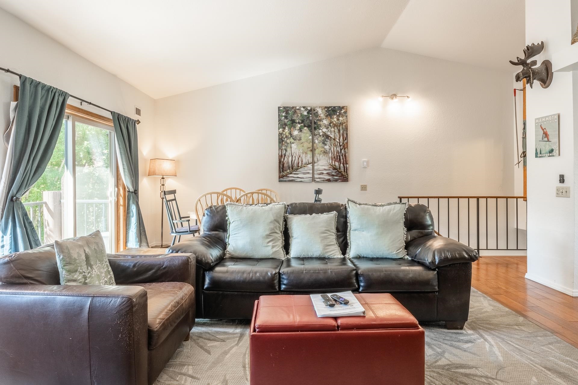 354 Joaquin Road, Unit 4 Mammoth Lakes, CA 93546 - Photo 7 of 40 Living room featuring light wood-type flooring and vaulted ceiling