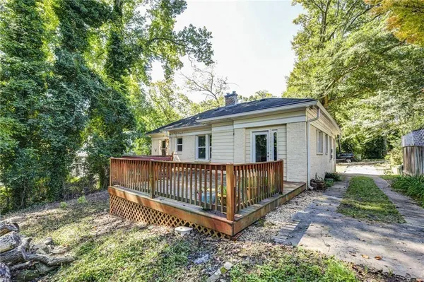 a house with trees in the background