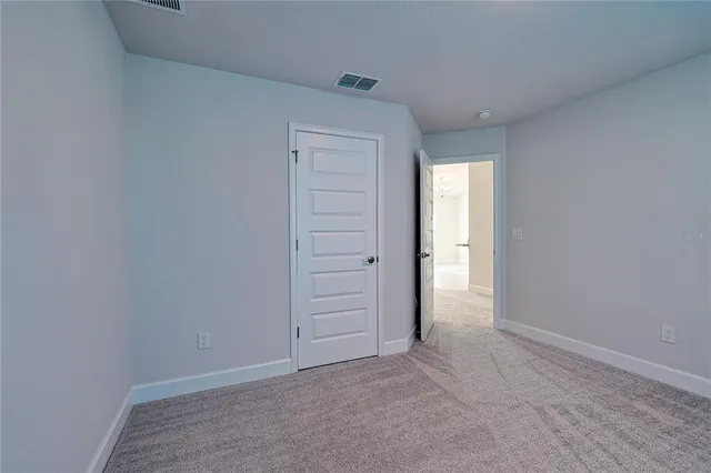 an empty room with closet