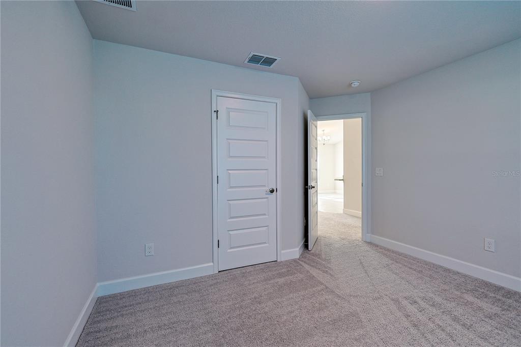 10939 Southwest 41st Avenue Ocala, FL 34476 - Photo 23 of 40 an empty room with closet
