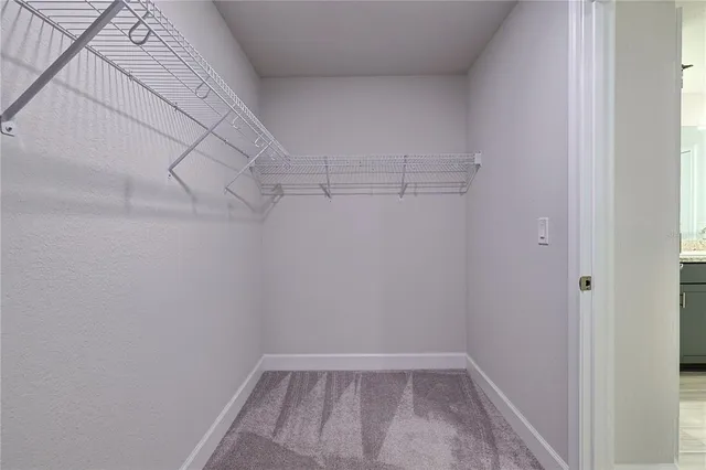 a view of a room with racks on the wall