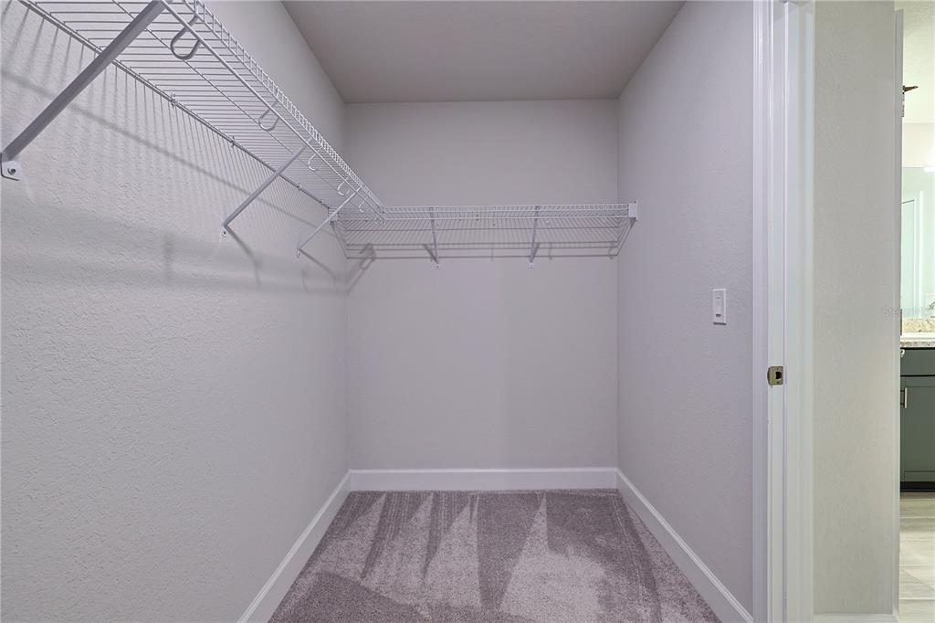 10939 Southwest 41st Avenue Ocala, FL 34476 - Photo 35 of 40 a view of a room with racks on the wall