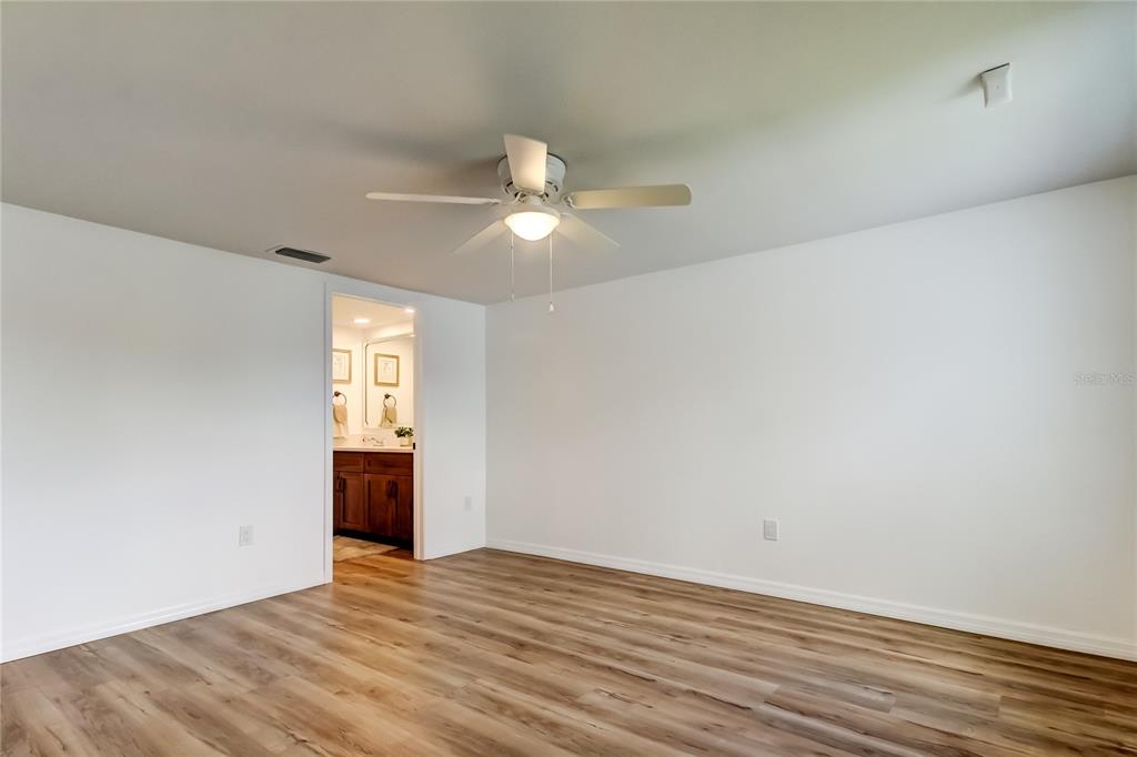 3625 Delta Place Holiday, FL 34691 - Photo 22 of 48 wooden floor in an empty room