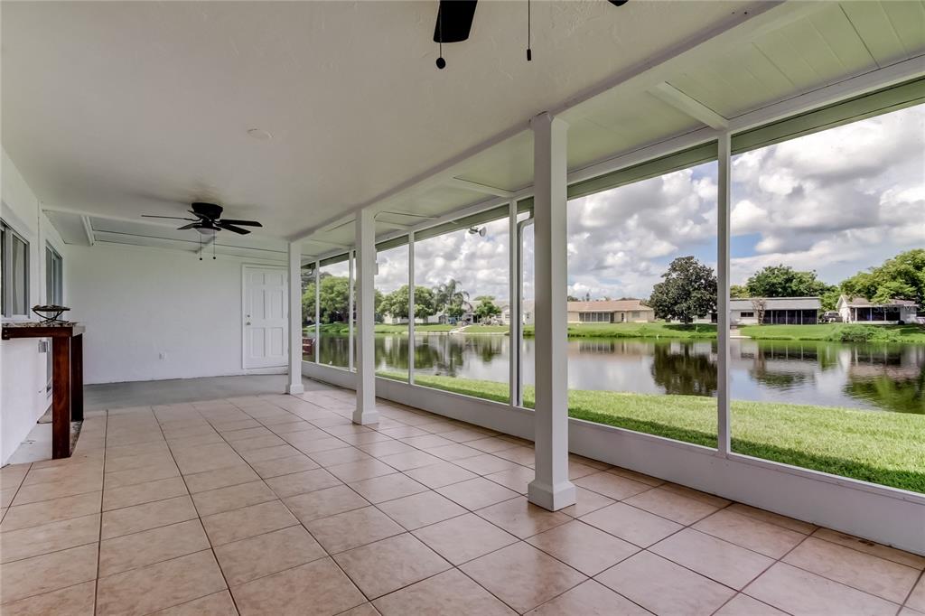 3625 Delta Place Holiday, FL 34691 - Photo 27 of 48 a view of an empty room with a floor to ceiling window