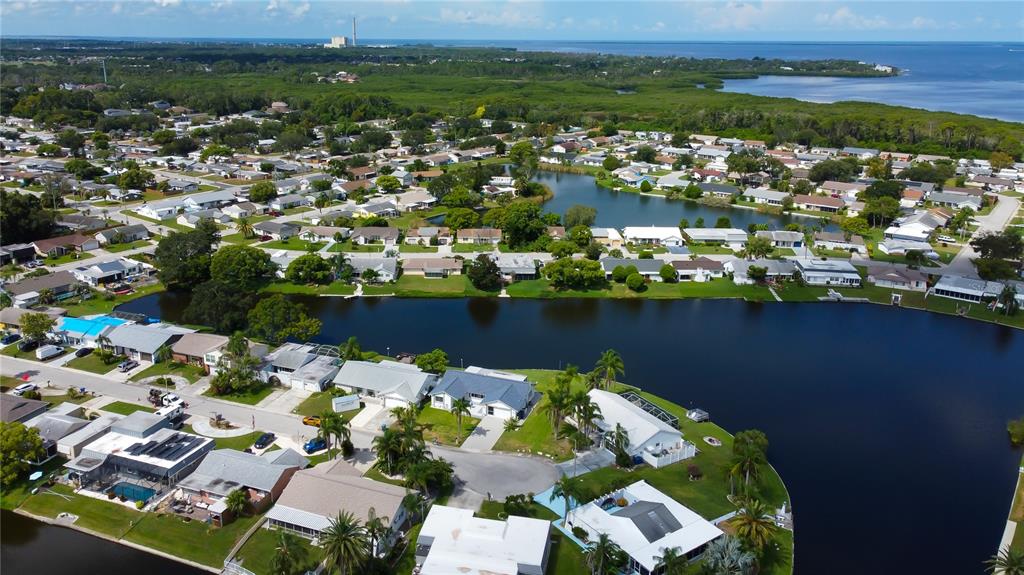3625 Delta Place Holiday, FL 34691 - Photo 30 of 48 an aerial view of a house with a lake view