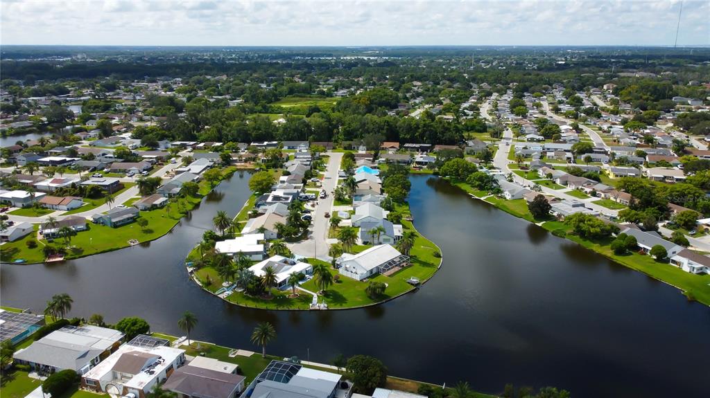 3625 Delta Place Holiday, FL 34691 - Photo 34 of 48 an aerial view of a house with a yard