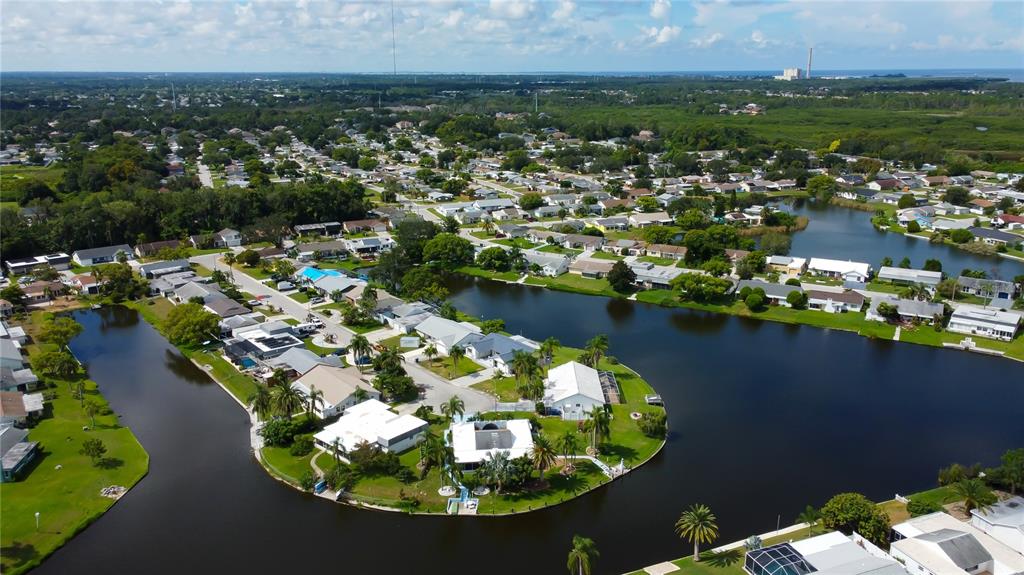 3625 Delta Place Holiday, FL 34691 - Photo 35 of 48 an aerial view of a house with a lake view