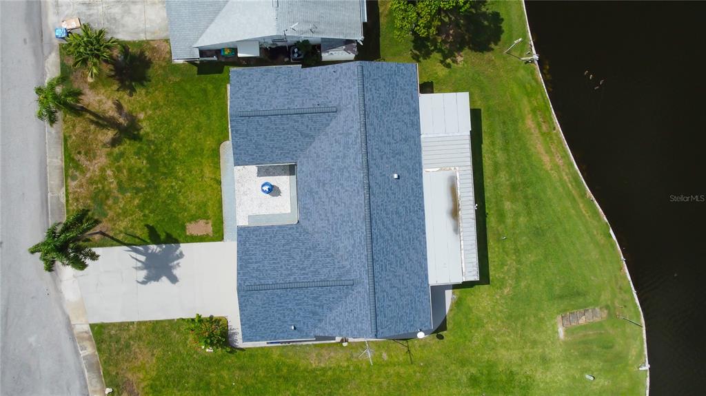 3625 Delta Place Holiday, FL 34691 - Photo 38 of 48 an aerial view of a house with a yard
