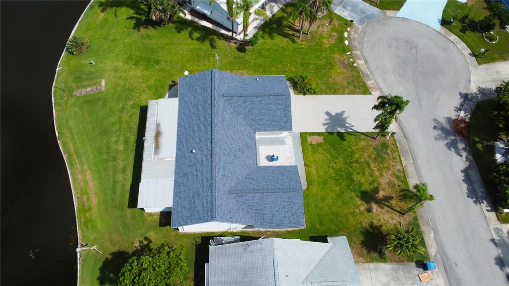 3625 Delta Place Holiday, FL 34691 - Photo 39 of 48 an aerial view of a house with a yard