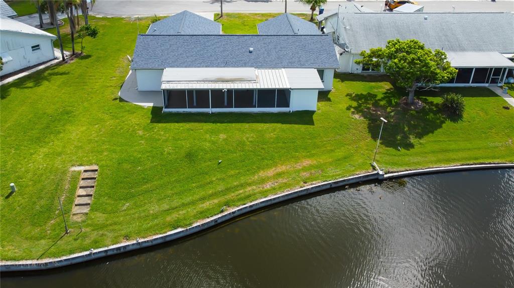 3625 Delta Place Holiday, FL 34691 - Photo 47 of 48 a aerial view of a house with a garden and swimming pool
