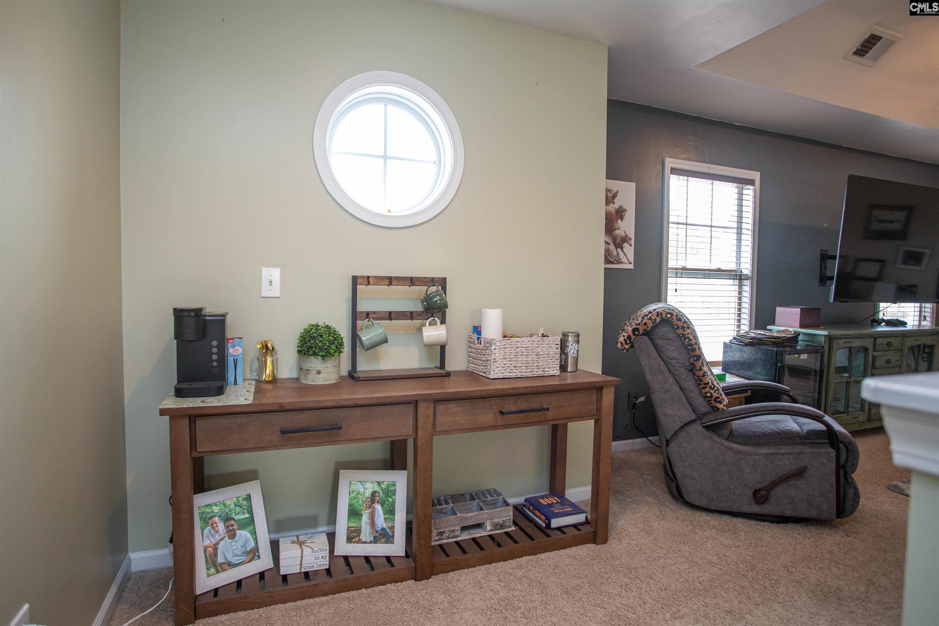 7 Templand Court Elgin, SC 29045 - Photo 42 of 47 a living room with furniture and a wooden floor