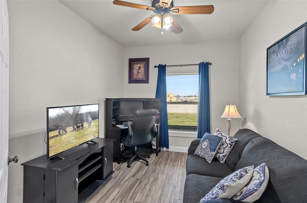 459 Pr Road 2625 Decatur, TX 76234 - Photo 16 of 40 a living room with furniture and a flat screen tv